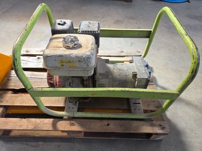 a small pump on a pallet in a warehouse