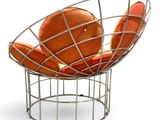 an image of a modern chair with orange cushions on a white background