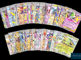 beaucoup de cartes pokemon sur la table