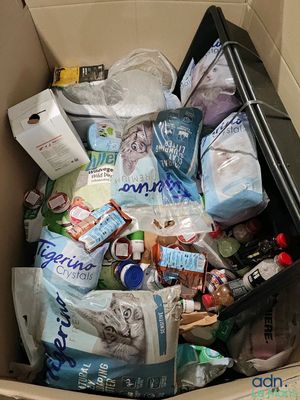 a cardboard box filled with various types of items