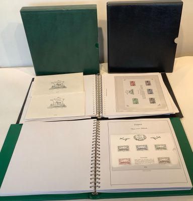three green binders are sitting on top of a white table