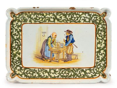 a picture of a plate with a picture of a man and a woman sitting at a table