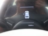 a man taking a picture of himself in a car