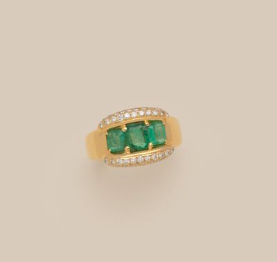 an emerald and diamond ring