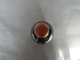 a close up view of a bottle of wine on a table