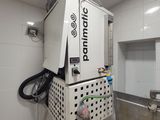 une photo d'une buanderie avec une machine à laver et un sèche-linge