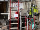 a lot of tools that are sitting outside of a building