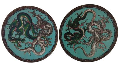 pair of two chinese dragon plates with blue background