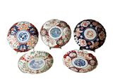 four different types of decorative bowls are shown on a white surface