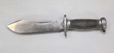 a knife that is laying on a table