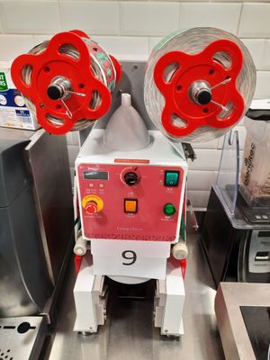 a machine that is sitting on a counter in a kitchen