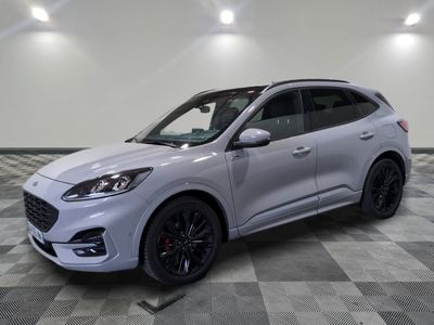 a white 2020 ford escape is parked in a large room