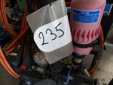 a close up of a pink fire hydrant with a price tag on it