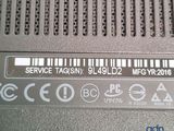 a close up of a label on the side of a laptop