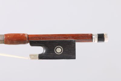 an image of a violin bow with a string attached to it