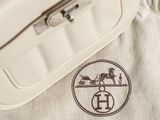 a white bag with a horse drawn on it