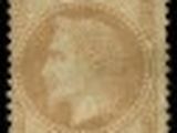 a stamp with a picture of a man on it on a black background