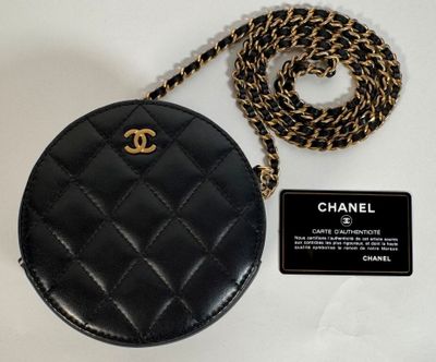 Sac rond matelassé noir Chanel avec chaîne dorée