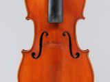 an old violin with a bow on a white background