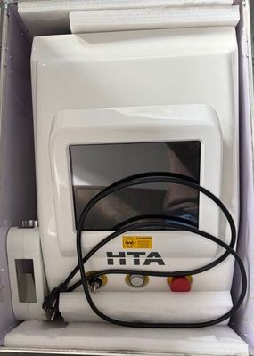 a white machine that is sitting in a box