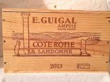 a wooden sign with a picture of a lighthouse on it