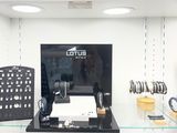 a lot of watches on display in a store