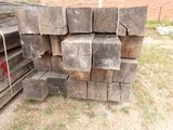 several pieces of wood stacked on top of each other in a yard