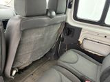 the interior of a van with the seats folded down and the front seats folded down