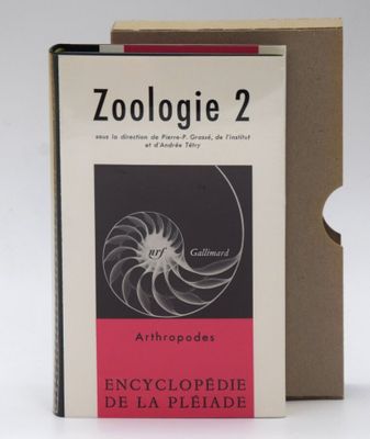 a book with a picture of a spiral design on it