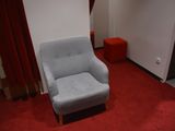 a chair that is sitting in the corner of a room