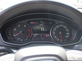the dashboard of a car with a speedometer, gauges, and a steering wheel