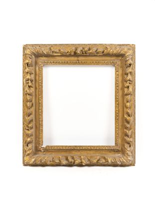 an old gold frame with a white background