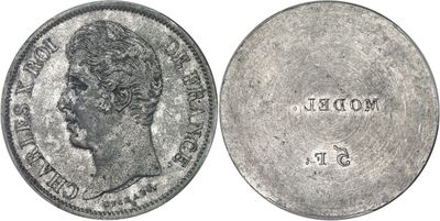 a close up of a coin with a woman ' s face on it