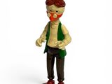 figurine de jouet représentant un homme avec une barbe et un chapeau