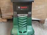 the bosch vacuum is sitting on the floor in front of a cardboard box