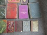 many books that are sitting on the floor together