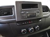 a dashboard of a car with a radio and other controls