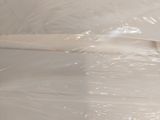 a toothbrush that is sitting on a plastic bag