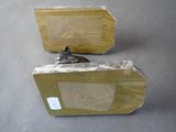 two pieces of cardboard sitting on top of each other