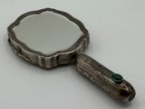 miroir grossissant plaqué argent orné d'une pierre verte sur le manche