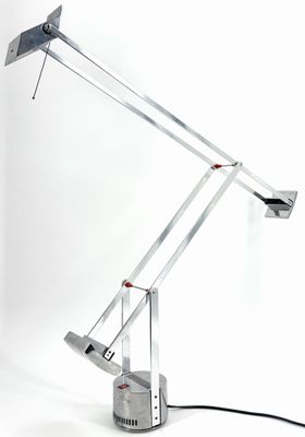 an image of a desk lamp that is on a white surface
