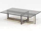 une photo d'une table basse en verre sur fond blanc