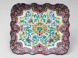 a colorful plate with a floral design on it