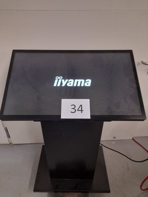 the display is black and has a green sign on it