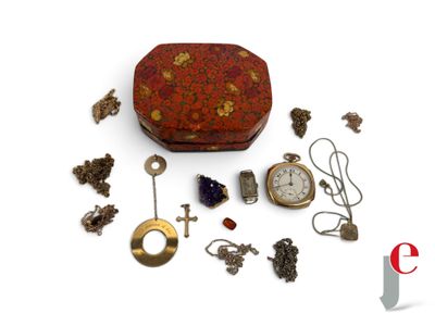 a red box with a bunch of jewelry on it
