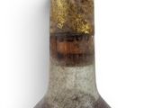 a bottle of wine that is sitting on a table
