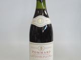 a bottle of wine that is sitting on a table