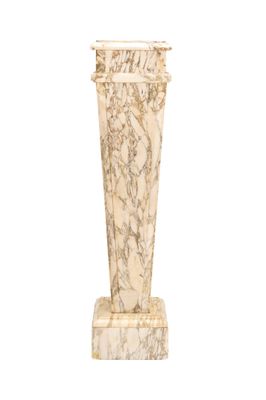 a marble pedestal with a flower vase on it