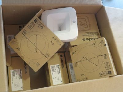 a box full of boxes of electronic devices on a table