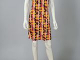 a mannequin wearing a colorful dress on a mannequin mannequin mannequin mannequin mannequin mannequin mannequin mann